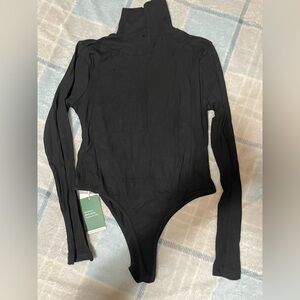 HALARA Black Long Sleeve Turtleneck Bodysuit - Ribbed Fit